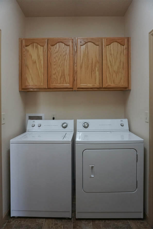 laundry room includes washer & dryer