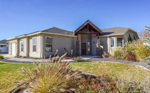 287 Sun Hawk Drive is a 4 bedroom, 2 bath home with an open concept living area, large master suite with a private patio, 5-piece bath, and walk-in closet. It has a 3-car garage + RV parking and a large back yard with a dedicated garden area and timed & pressurized irrigation.