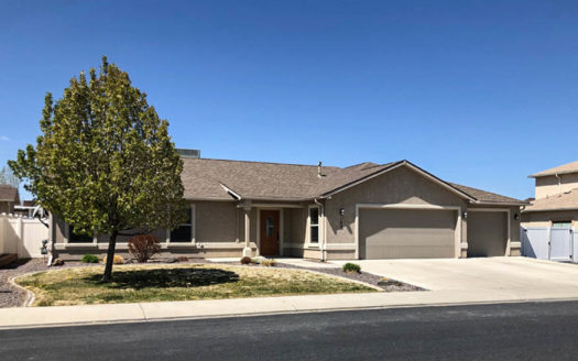 183 Winter Hawk Drive, a 4 bedroom, 2 bath home with a 3 car garage and RV parking.