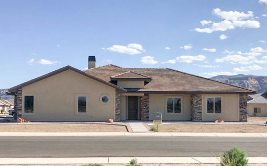 1484 Shoreline Drive, Fruita is a 3 bedroom, 2 bath home in Adobe Falls. This new construction home has LVP flooring throughout the home (except bedrooms), contemporary neutral colors, granite countertops, and custom tilework in the bathrooms.