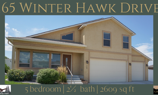165 Winter Hawk Dr is a 5 bedroom, 2½ bath 2609 square foot tri-level home in Hawks Nest on Orchard Mesa. It has a 3 car garage, RV parking, and multi-level back yard with dual patios.