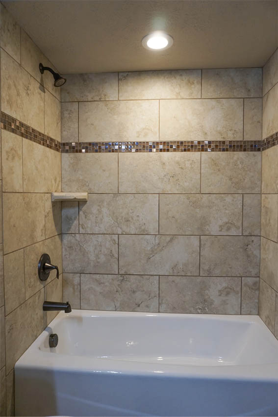 Custom tile work i n176 night hawk's hall bathroom