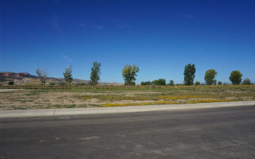 Looking north-west across 1325 Fairway Drive, a vacant lot in Fruita, CO.